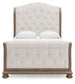 Ardenfield Queen Upholstered Sleigh Bed with Mirrored Dresser and Chest