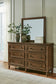 Sturlayne Queen Upholstered Panel Bed with Mirrored Dresser and Nightstand